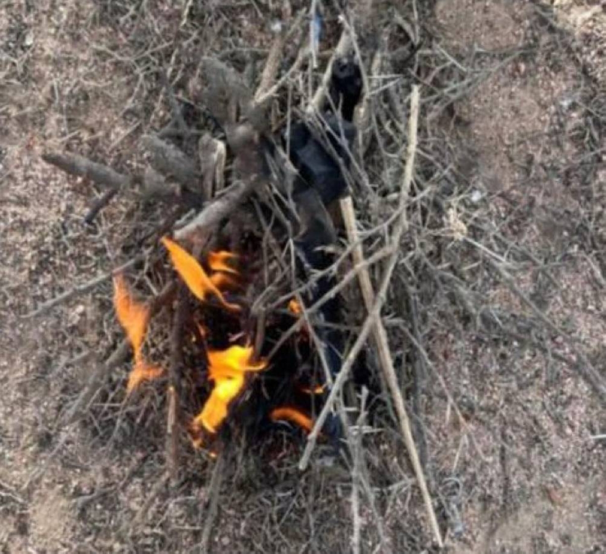 ضبط مخالف لإشعال النار بغير أماكنها في عسير