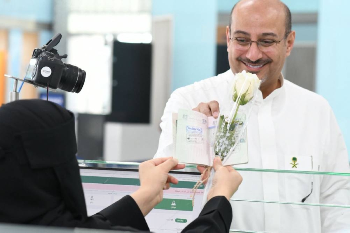 احتفالات الجوازات باليوم الوطني الـ95 في المنافذ الدولية