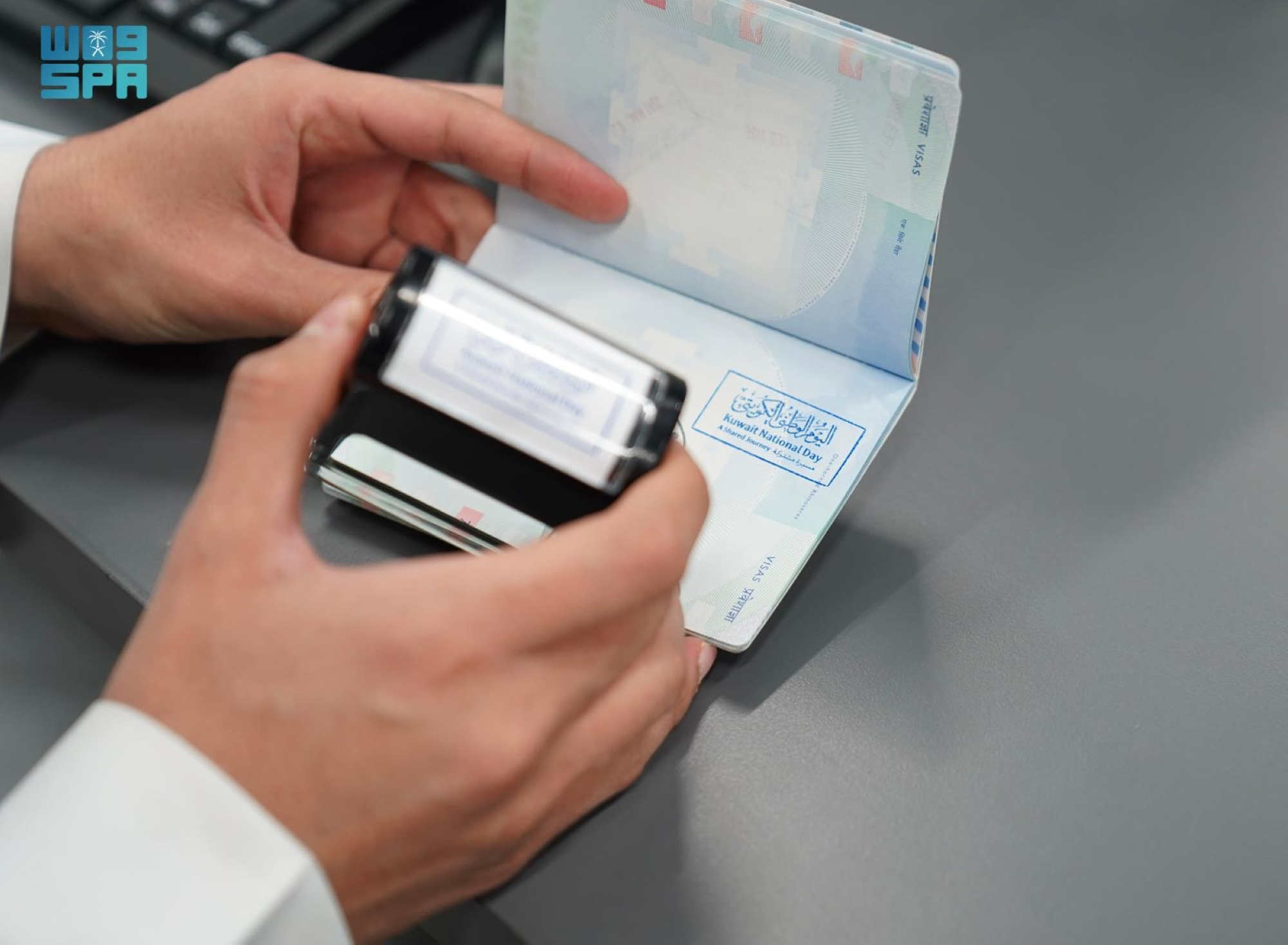 Passports Department celebrates Kuwait's 65th National Day at border crossings